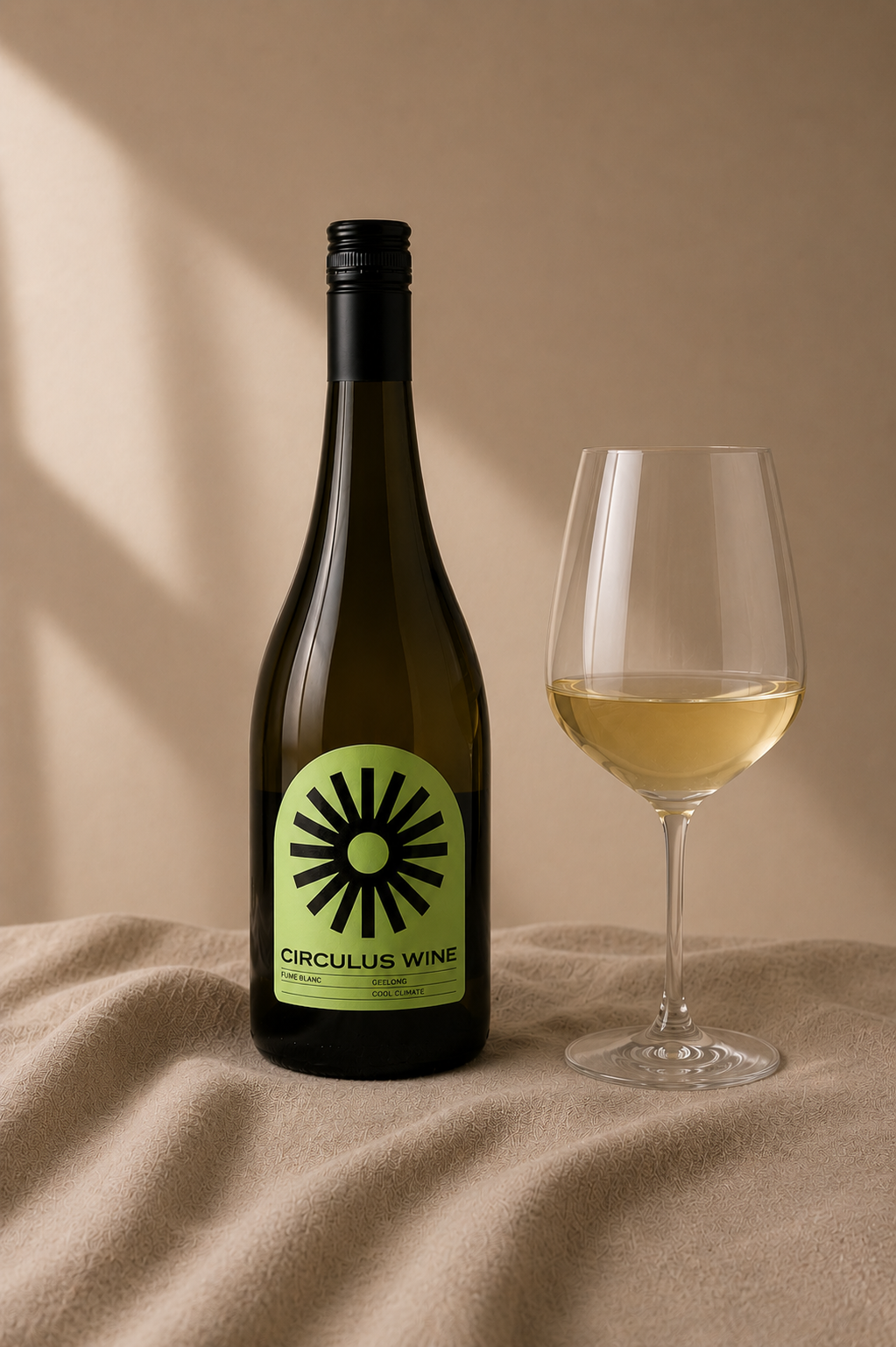 Bottle of Circulus white Wine with a glass of wine on a beige surface